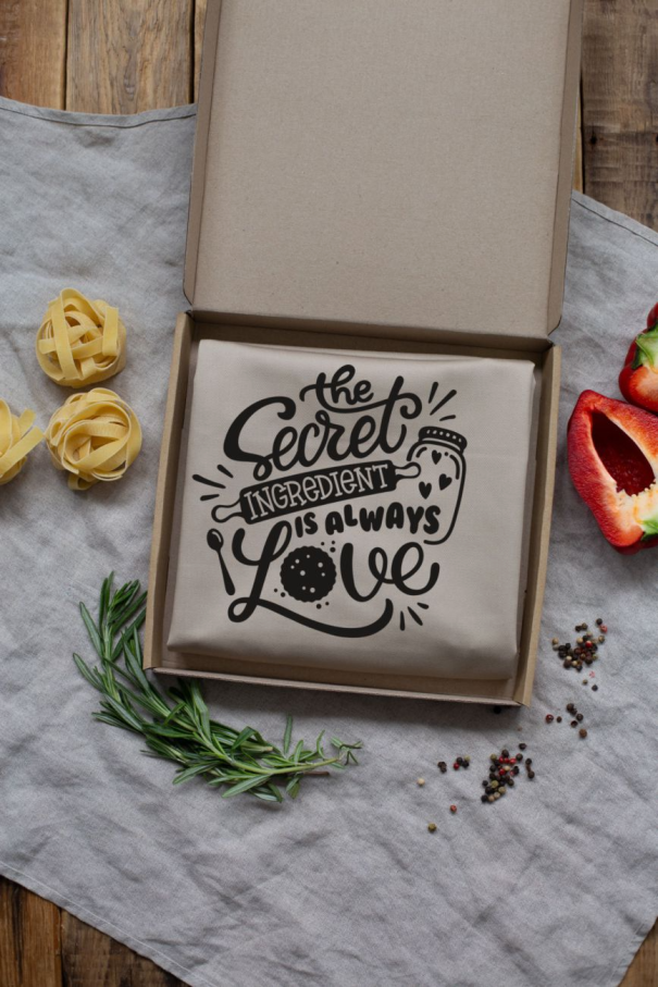 Фартух "The secret ingredient is always love" бежевий